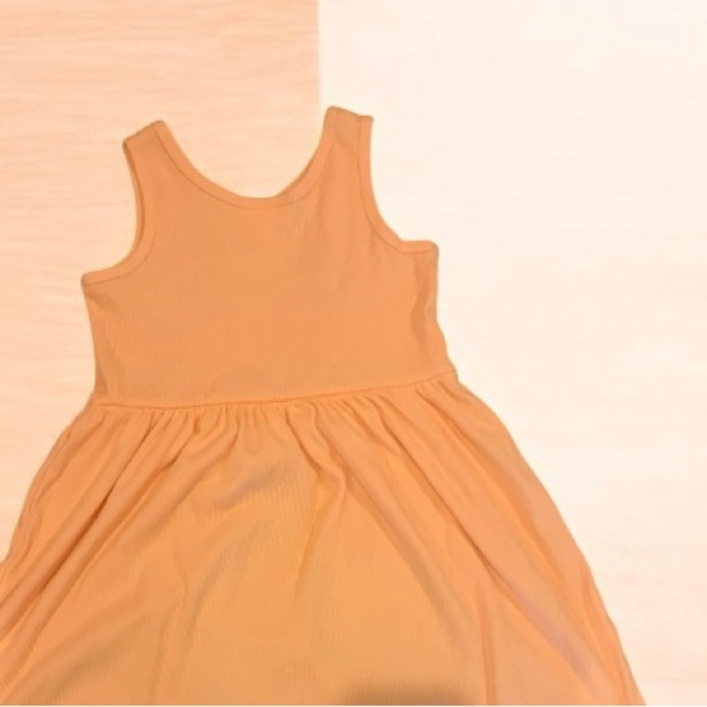 Buy 1 get one 50% off
Cat & Jack Peach Ribbed Sleeveless Top